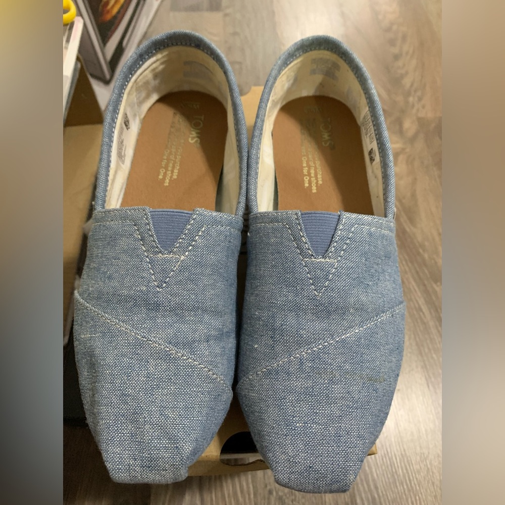TOMS light blue slip on